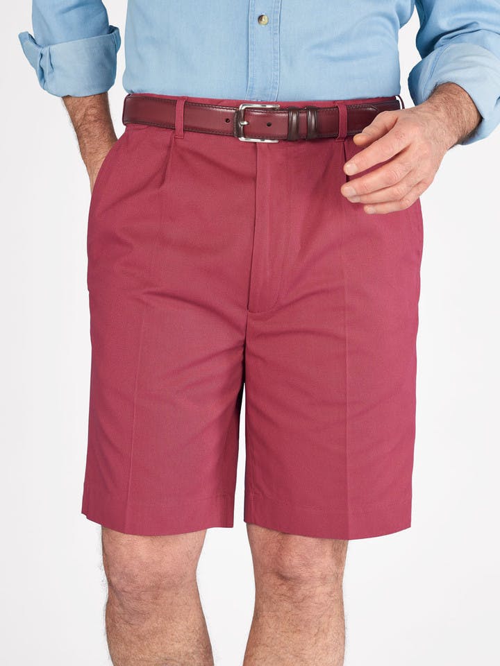 Model wears Men's Brick Red Cotton Pleated Shorts