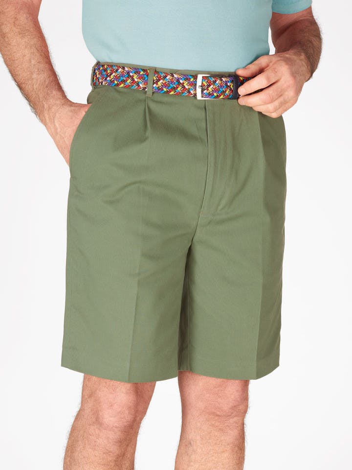 Model wears Men's Green Cotton Pleated Shorts