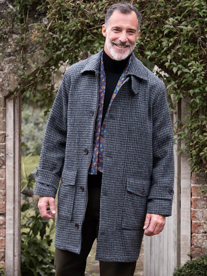 Model wears Grey Houndstooth Harris Tweed Overcoat