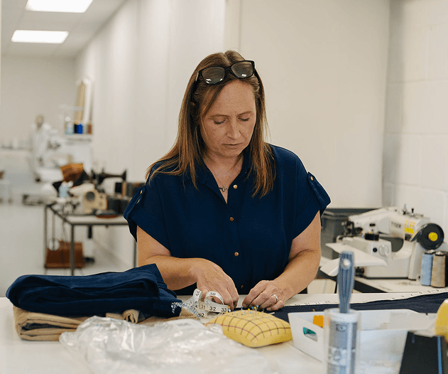 Tailor measuring trousers