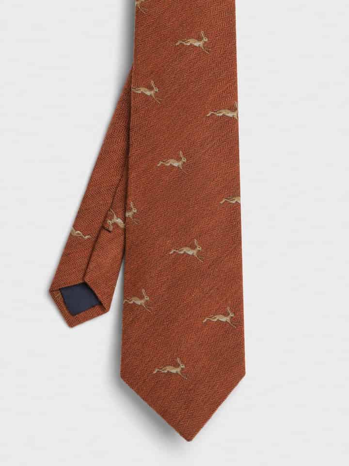 Rust Leaping Hares Tie